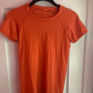 swiftly tech orange/red top